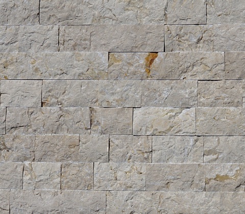 Kamień elewacyjny split z beżowego marmuru beige crystallino wykończenie łupane
